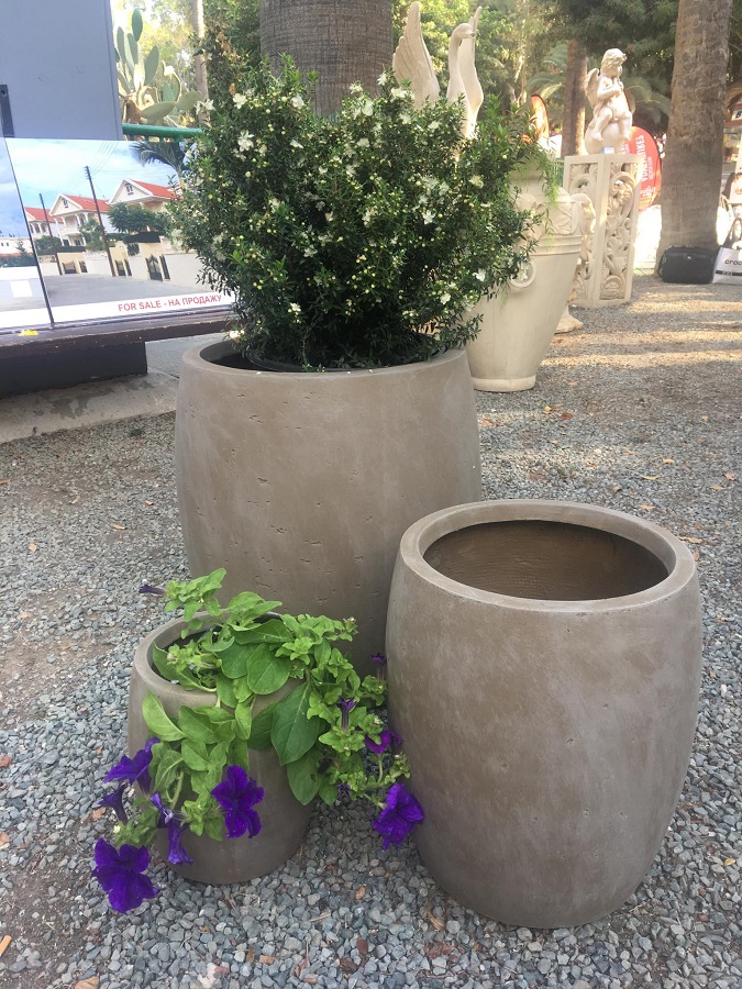 Change the look of your garden by placing beautiful flower- pots!